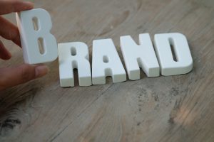 hand-arrange-white-letters-brand_1384-101
